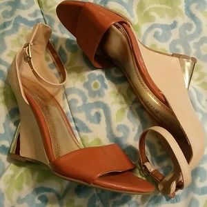 Brand new, never worn, ankle strap wedge heels
